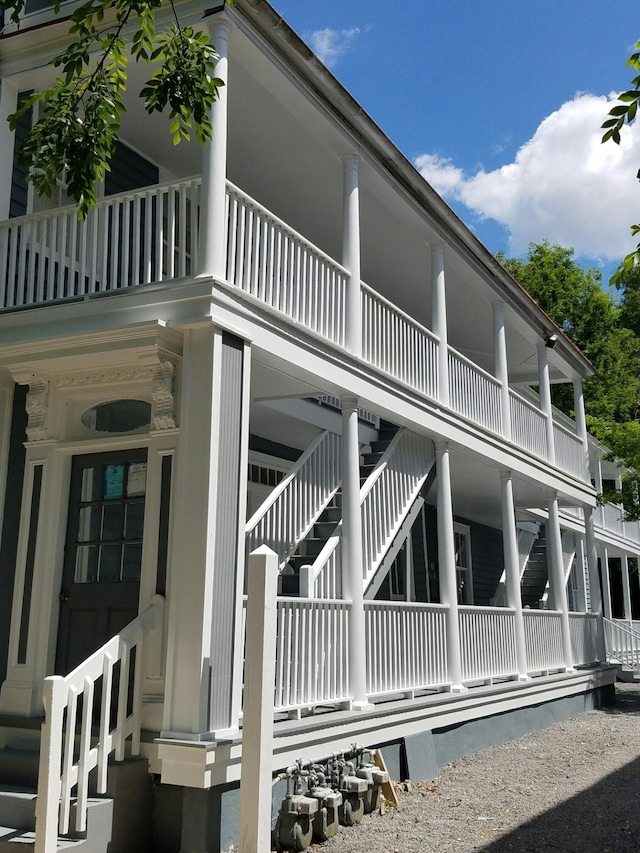 view of home's exterior with a balcony