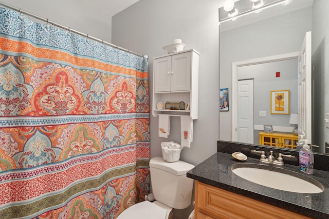 1984 Folly Rd Unit A310, Charleston, SC 29412 - bathroom with toilet, vanity, and a shower with curtain