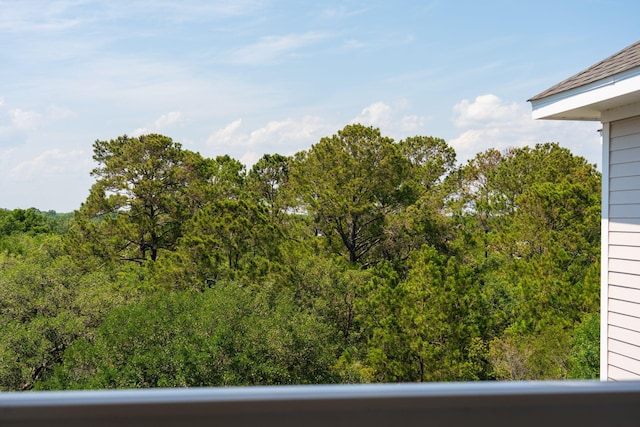 1984 Folly Rd Unit A310, Charleston, SC 29412 - view of yard featuring a balcony and a forest view