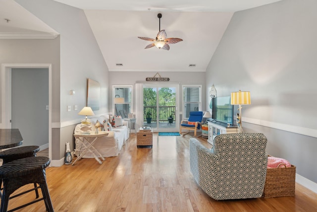 1984 Folly Rd Unit A310, Charleston, SC 29412 - living area featuring a ceiling fan, high vaulted ceiling, light wood-style floors, baseboards, and crown molding