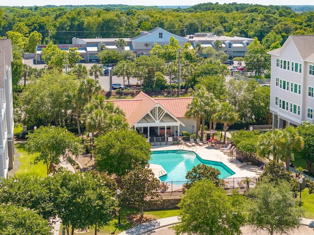 1984 Folly Rd Unit A310, Charleston, SC 29412 - community pool with a patio and a forest view