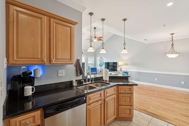 1984 Folly Rd Unit A310, Charleston, SC 29412 - kitchen featuring stainless steel dishwasher, a sink, lofted ceiling, hanging light fixtures, and light tile patterned floors