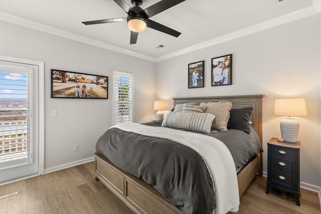 226 Midtown Ave, Summerville, SC 29486 - bedroom with light wood-style floors, ornamental molding, access to exterior, baseboards, and a ceiling fan