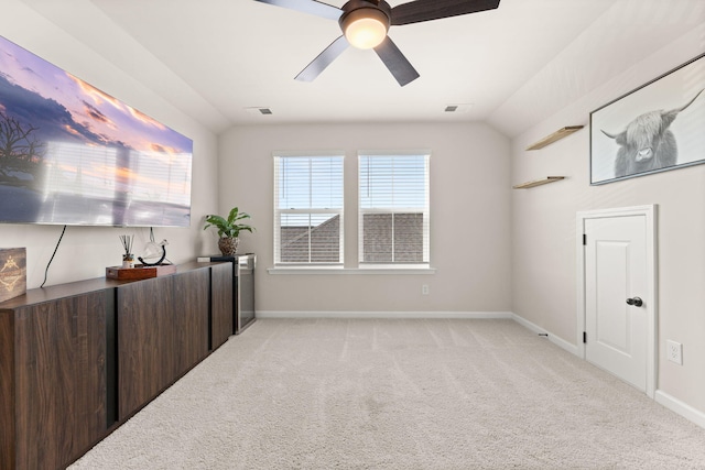 226 Midtown Ave, Summerville, SC 29486 - unfurnished bedroom with light carpet, baseboards, ceiling fan, and lofted ceiling