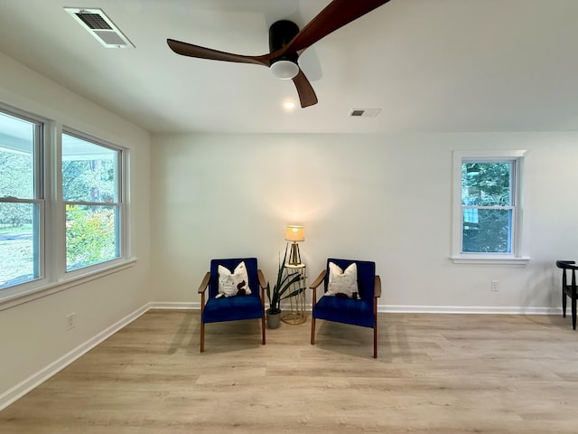 6086 Chisolm Rd, Johns Island, SC 29455 - sitting room featuring light wood-style floors, baseboards, a ceiling fan, and visible vents
