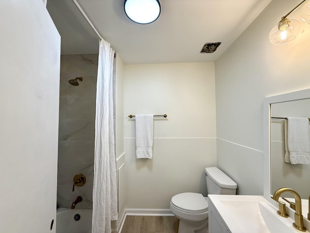 6086 Chisolm Rd, Johns Island, SC 29455 - bathroom with vanity, shower / bath combo with shower curtain, toilet, and wood finished floors