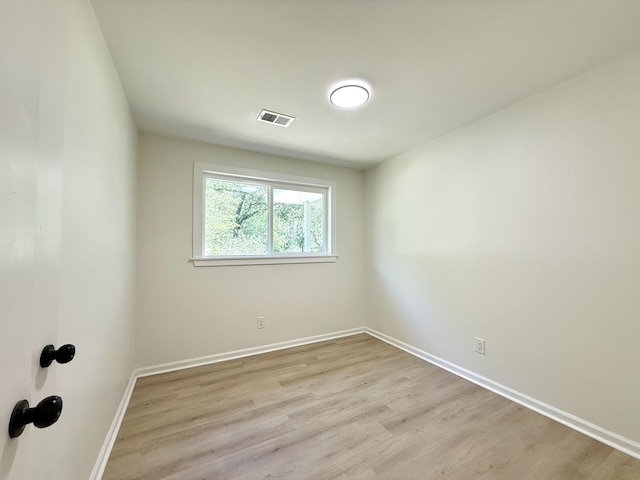 6086 Chisolm Rd, Johns Island, SC 29455 - spare room with baseboards, visible vents, and light wood finished floors