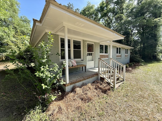 6086 Chisolm Rd, Johns Island, SC 29455 - view of front of house featuring brick siding