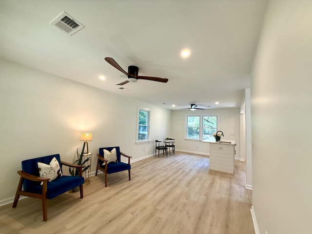 6086 Chisolm Rd, Johns Island, SC 29455 - living area with ceiling fan, light wood-style floors, recessed lighting, baseboards, and visible vents