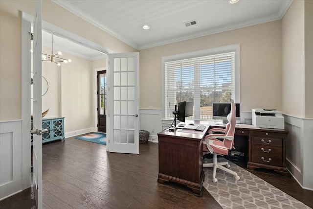 office with visible vents, dark wood-type flooring, ornamental molding, and french doors