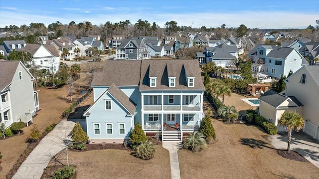 drone / aerial view featuring a residential view