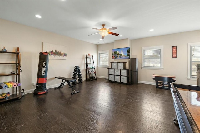 workout area with a ceiling fan, recessed lighting, wood finished floors, and baseboards