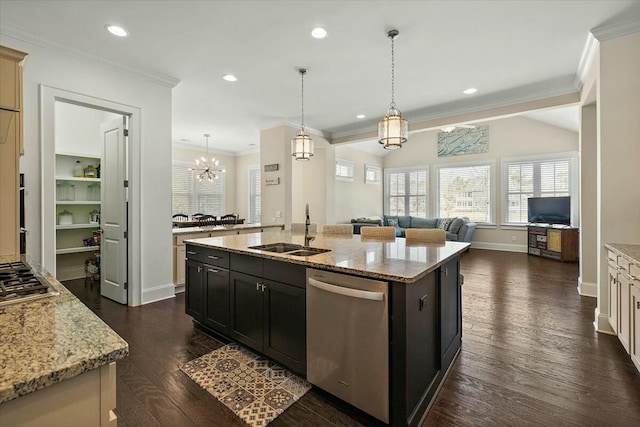 kitchen with a sink, open floor plan, dark wood-style floors, stainless steel appliances, and crown molding