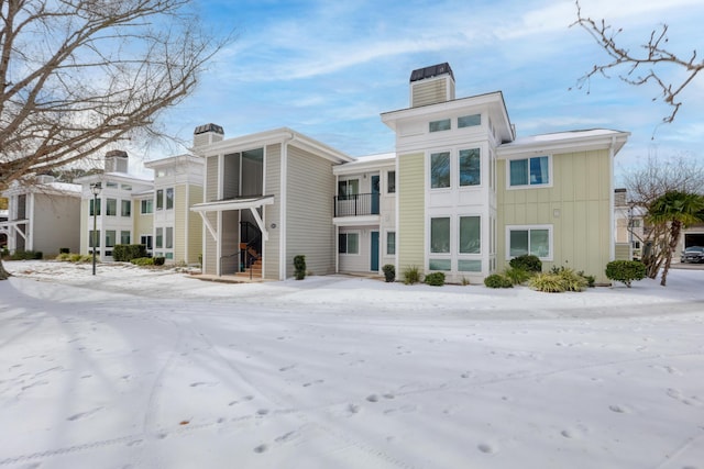 view of snow covered building