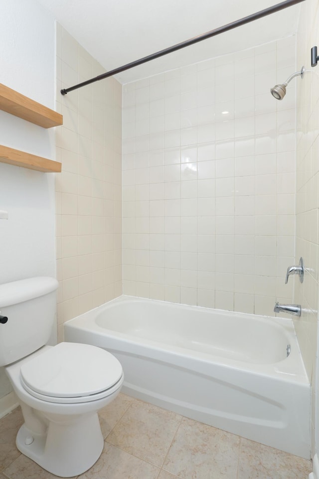 bathroom featuring bathtub / shower combination and toilet