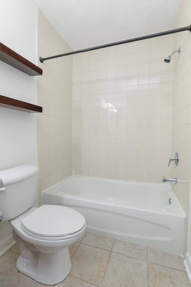 bathroom with toilet, tub / shower combination, and tile patterned flooring