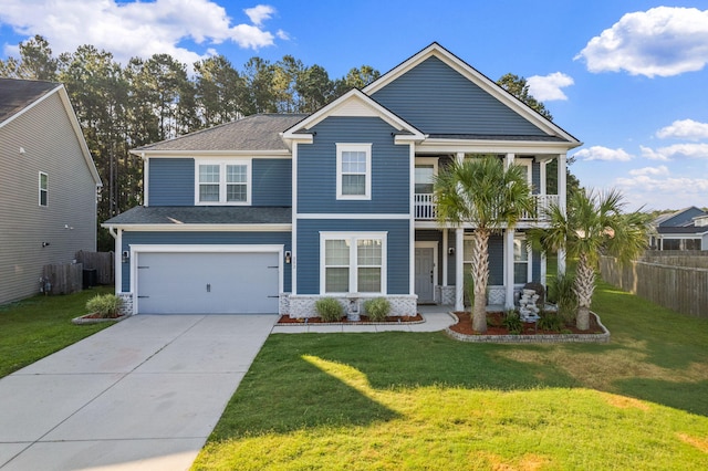 202 Buttercup Ln, Summerville, SC 29486 - view of front facade with driveway, a garage, a shingled roof, and a balcony
