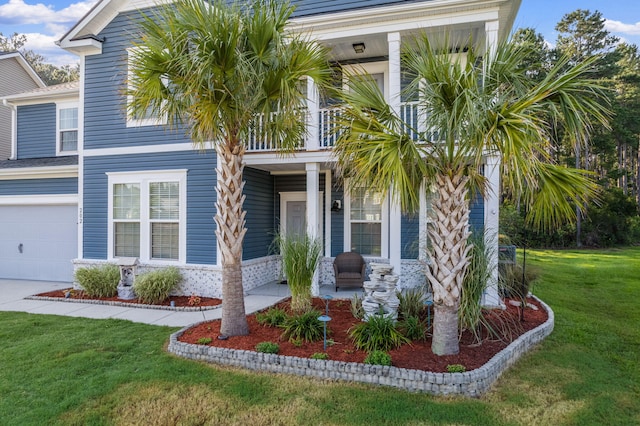 202 Buttercup Ln, Summerville, SC 29486 - view of front of home featuring covered porch, a front lawn, an attached garage, and driveway