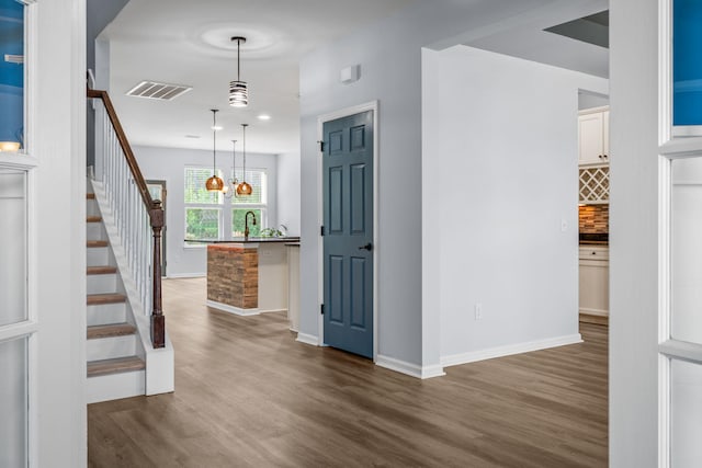 202 Buttercup Ln, Summerville, SC 29486 - foyer with stairs, wood finished floors, and a chandelier