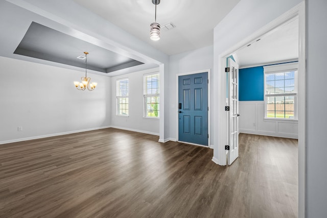 202 Buttercup Ln, Summerville, SC 29486 - entrance foyer with a chandelier, dark wood-type flooring, and a raised ceiling