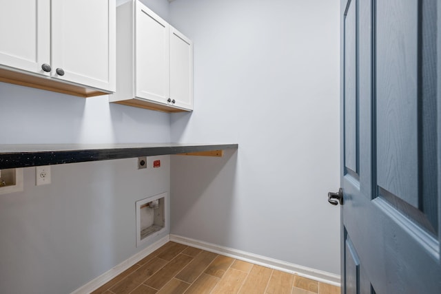 202 Buttercup Ln, Summerville, SC 29486 - washroom with electric dryer hookup, cabinet space, and wood finished floors
