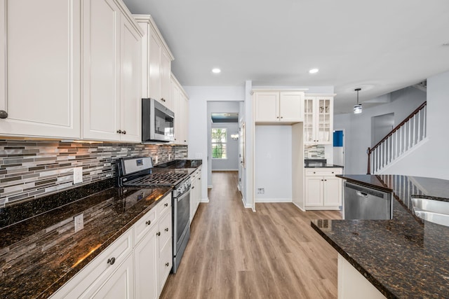202 Buttercup Ln, Summerville, SC 29486 - kitchen featuring stainless steel appliances, light wood-type flooring, tasteful backsplash, white cabinets, and recessed lighting