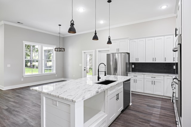 621 Plantation Dr, Santee, SC 29142 - kitchen with decorative backsplash, stainless steel appliances, dark wood-style floors, and a sink