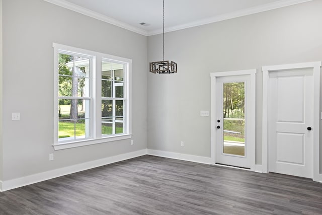621 Plantation Dr, Santee, SC 29142 - unfurnished dining area with baseboards, a notable chandelier, ornamental molding, and dark wood finished floors