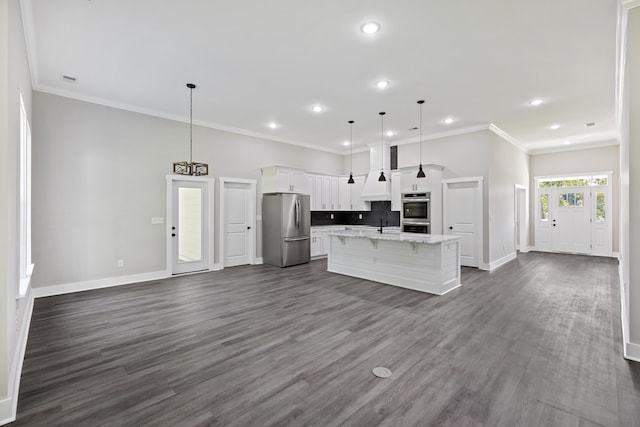 621 Plantation Dr, Santee, SC 29142 - kitchen featuring baseboards, recessed lighting, an island with sink, and appliances with stainless steel finishes