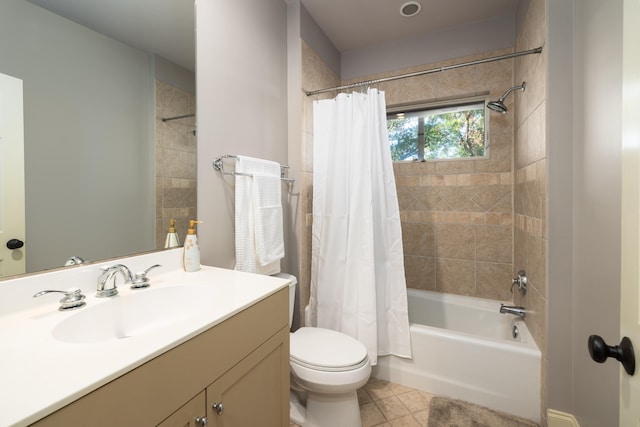 full bathroom featuring shower / bath combo, vanity, and toilet