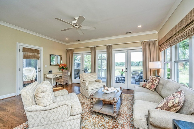 1227 River Rd, Johns Island, SC 29455 - living area featuring french doors, crown molding, healthy amount of natural light, wood finished floors, and recessed lighting