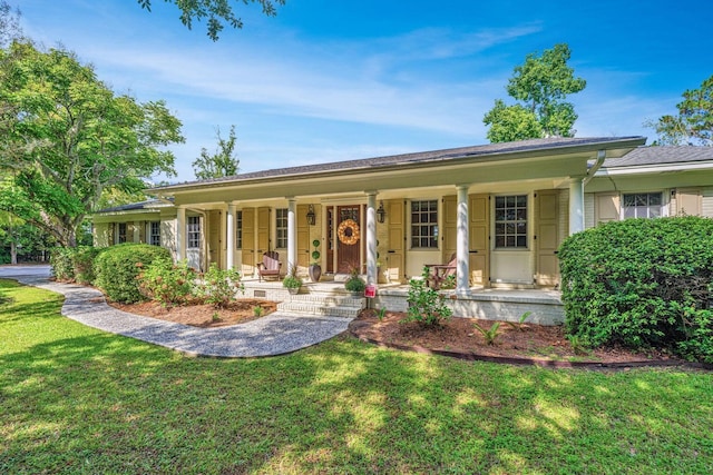 1227 River Rd, Johns Island, SC 29455 - ranch-style house with a porch and a front lawn