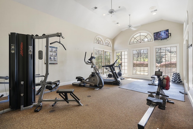 exercise room featuring visible vents, a ceiling fan, carpet, and vaulted ceiling
