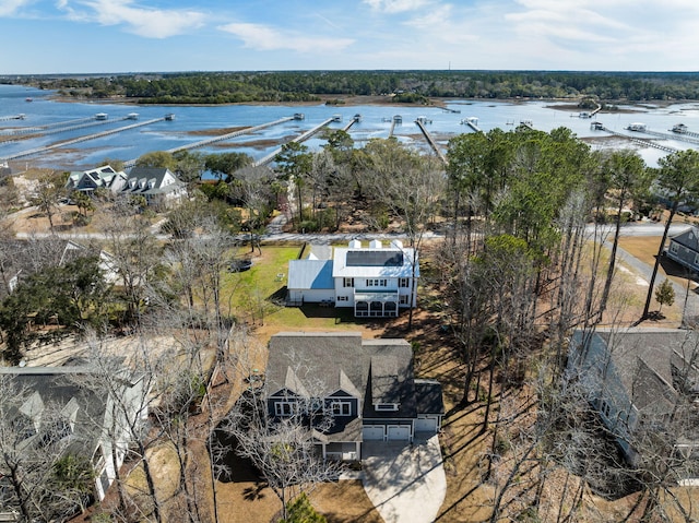 birds eye view of property featuring a water view