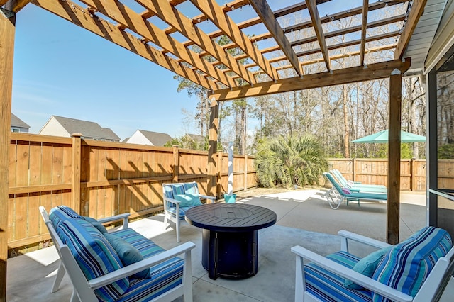 view of patio / terrace with a fenced backyard, an outdoor hangout area, and a pergola