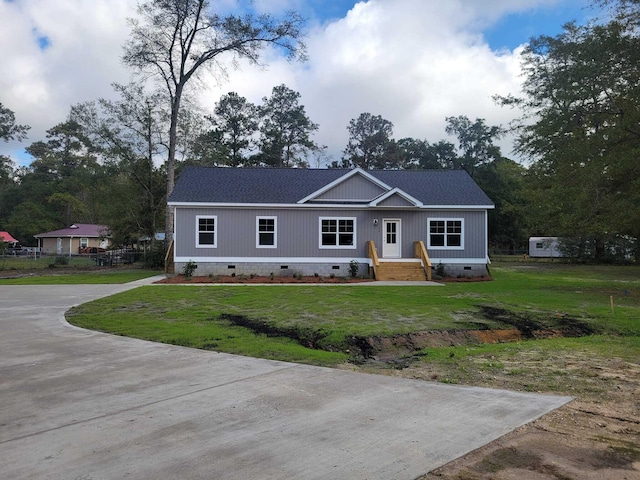 view of front of home with a front lawn