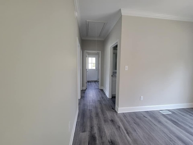 hall featuring dark hardwood / wood-style flooring and crown molding