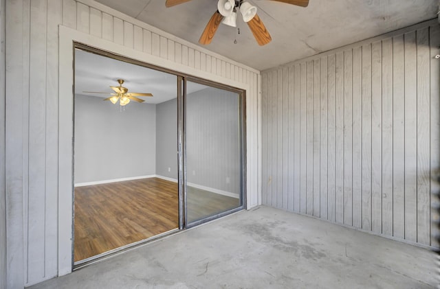 exterior space featuring ceiling fan