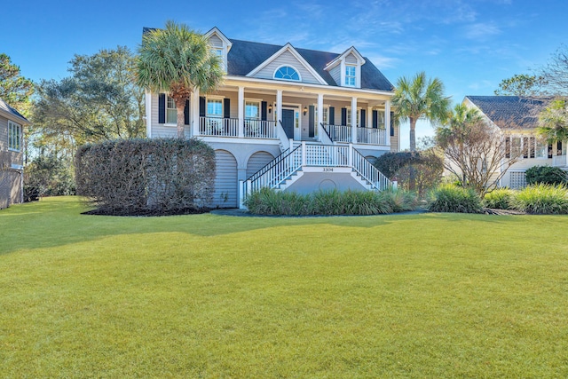 view of front of property with a front yard and covered porch