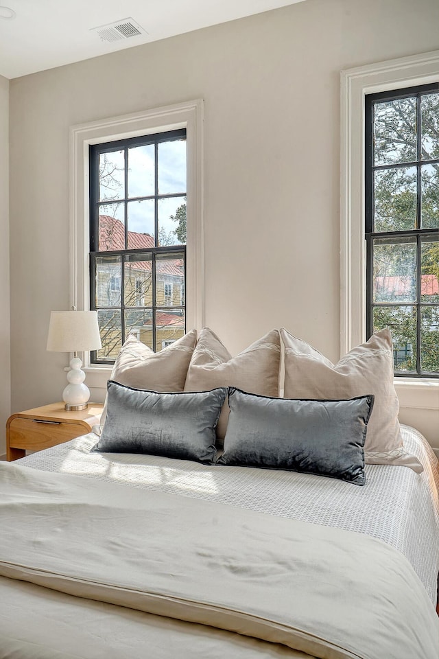 bedroom with visible vents