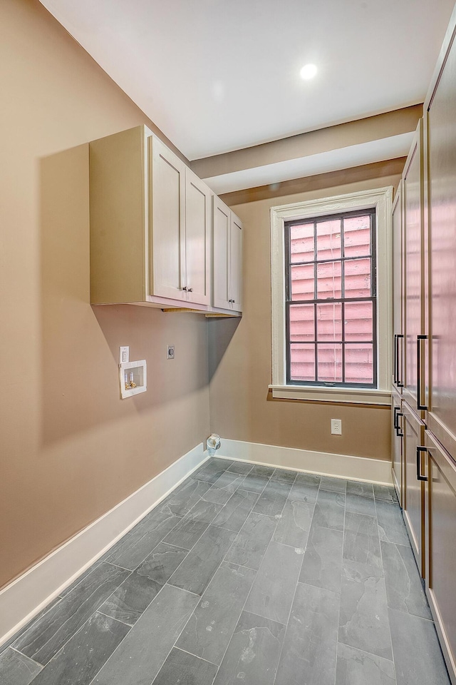 clothes washing area featuring recessed lighting, cabinet space, baseboards, hookup for an electric dryer, and hookup for a washing machine