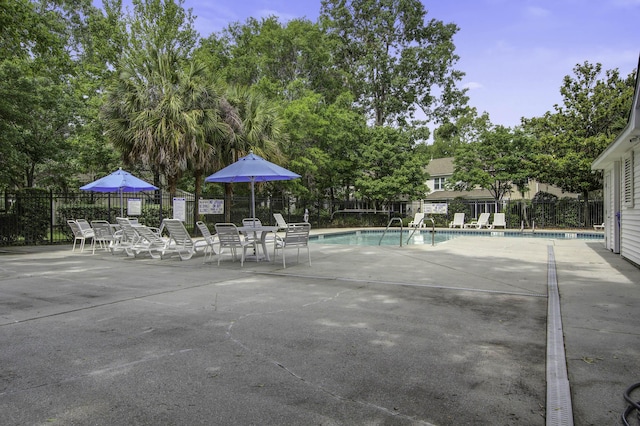 8059 Shadow Oak Dr, North Charleston, SC 29406 - community pool with a patio area