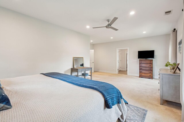 carpeted bedroom with ceiling fan