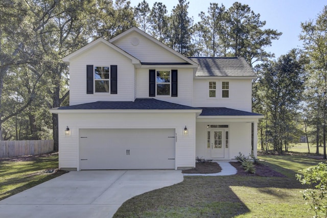 5629 Ellington School Rd, Ravenel, SC 29470 - view of front of property featuring an attached garage, driveway, and a shingled roof