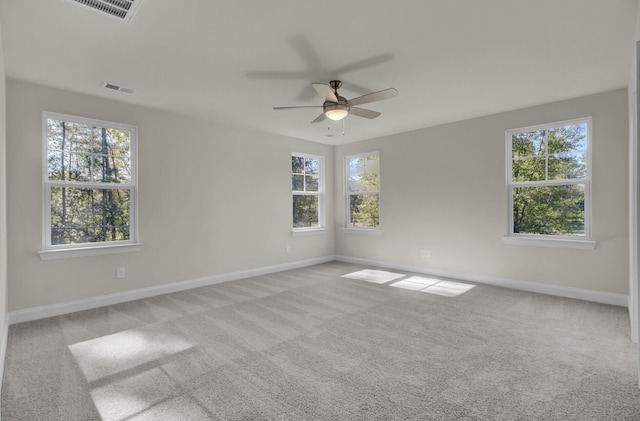 5629 Ellington School Rd, Ravenel, SC 29470 - spare room with a ceiling fan, carpet, and baseboards