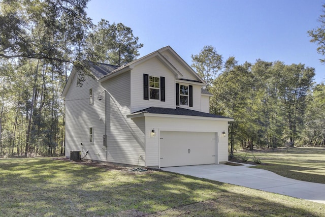 5629 Ellington School Rd, Ravenel, SC 29470 - view of front facade featuring a garage, concrete driveway, and a front lawn