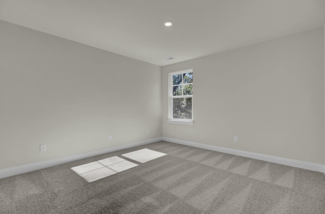 5629 Ellington School Rd, Ravenel, SC 29470 - spare room with light carpet, baseboards, and recessed lighting