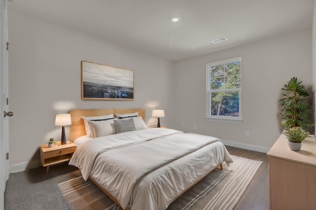 5629 Ellington School Rd, Ravenel, SC 29470 - bedroom featuring baseboards, dark wood finished floors, and recessed lighting