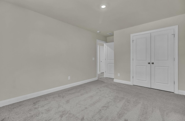 5629 Ellington School Rd, Ravenel, SC 29470 - unfurnished bedroom with carpet flooring, baseboards, and a closet