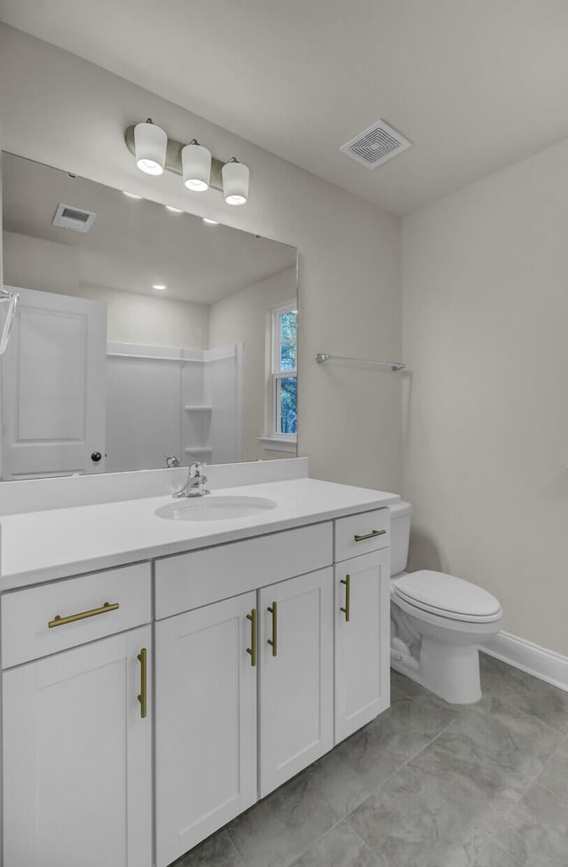 5629 Ellington School Rd, Ravenel, SC 29470 - bathroom with vanity, toilet, and a shower